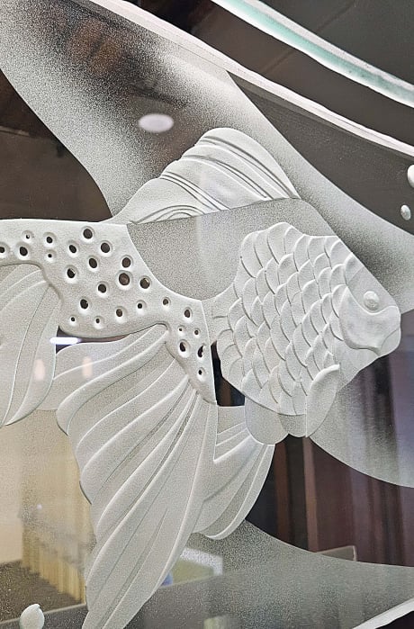 Carved fish etching